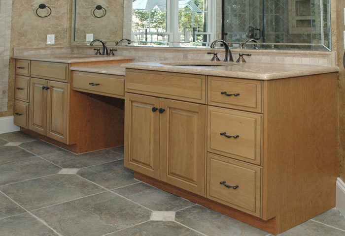 Custom Light Maple Finish Bathroom Cabinets by Noles Cabinets