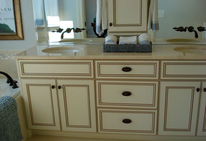 Custom Antique White Bathroom Cabinets by Noles Cabinets