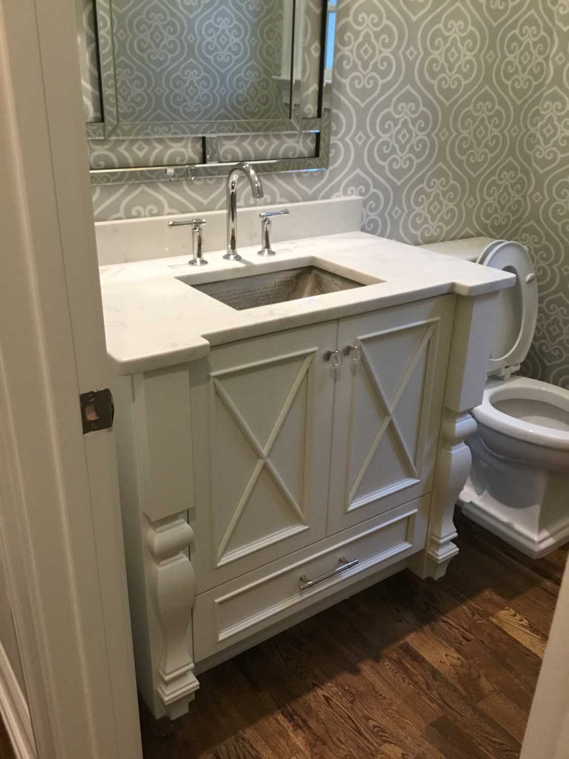 Custom Decorative Ornate Powder Room Sink Cabinet in White Finish by Noles Cabinets